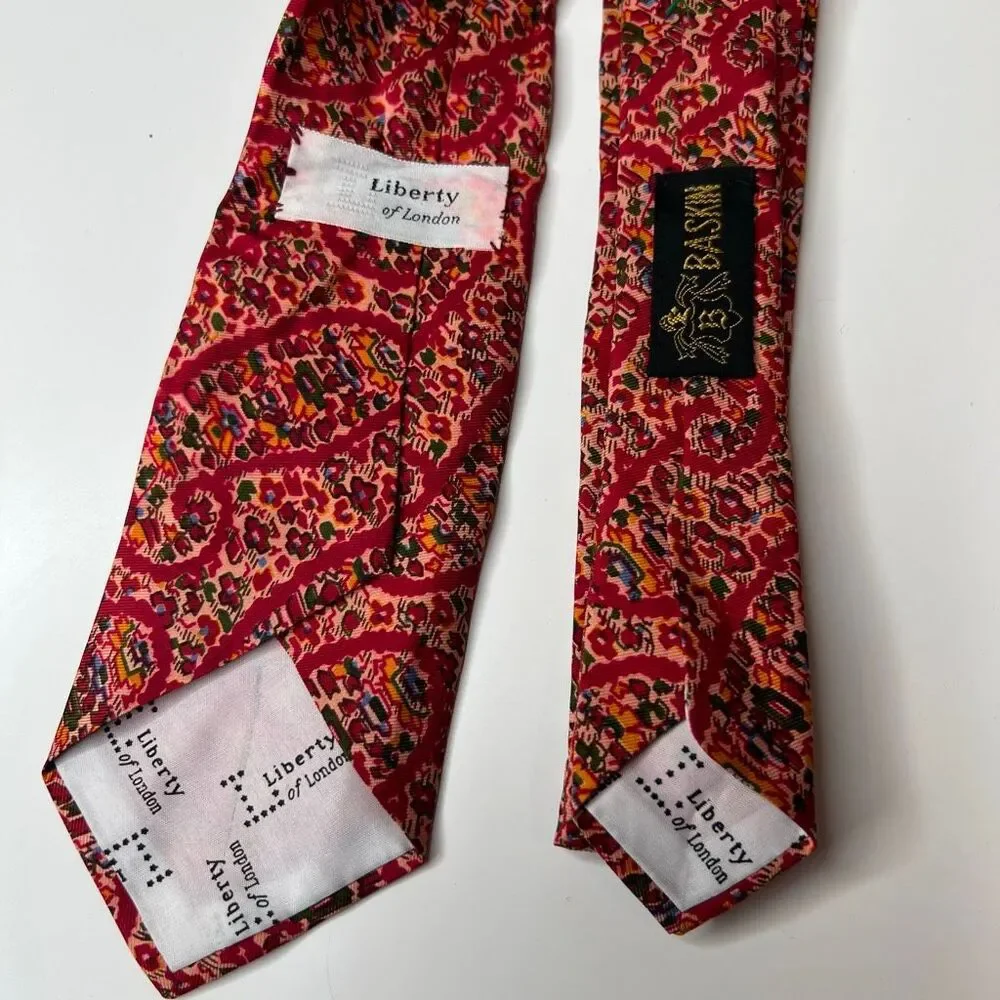 Liberty of London vintage red patterned silk necktie features a vibrant tie